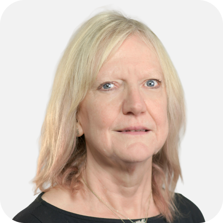 Professional headshot of a female IT team member with blonde hair against a clean white background.
